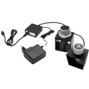 The image shows a HAPTICORE Eval Kit Combi Bundle consisting of a HAPTICORE 34-P001X2 and HAPTICORE 40-P001X1 Eval Kit as well as a HAPTICORE Control Unit Pro, including a 12 V power supply and USB-C connection cable.